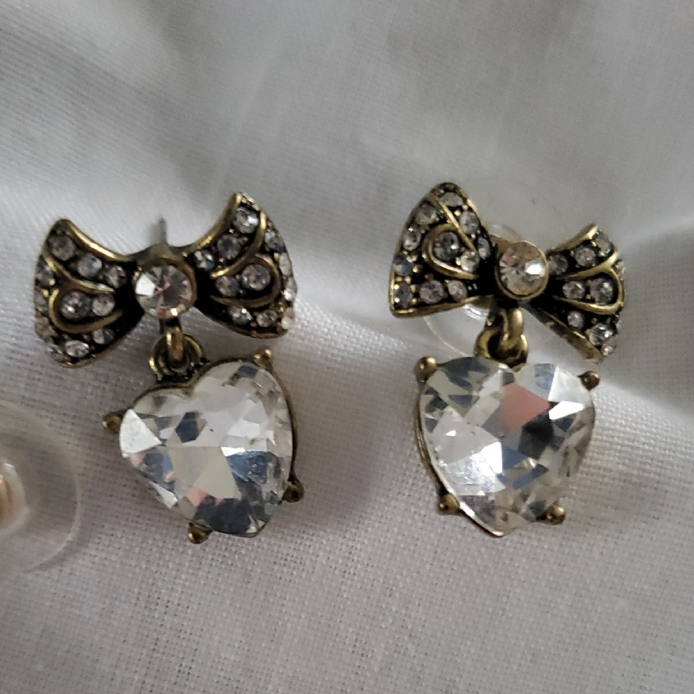 Elegant Crystal Heart Earrings with Bow Accents
